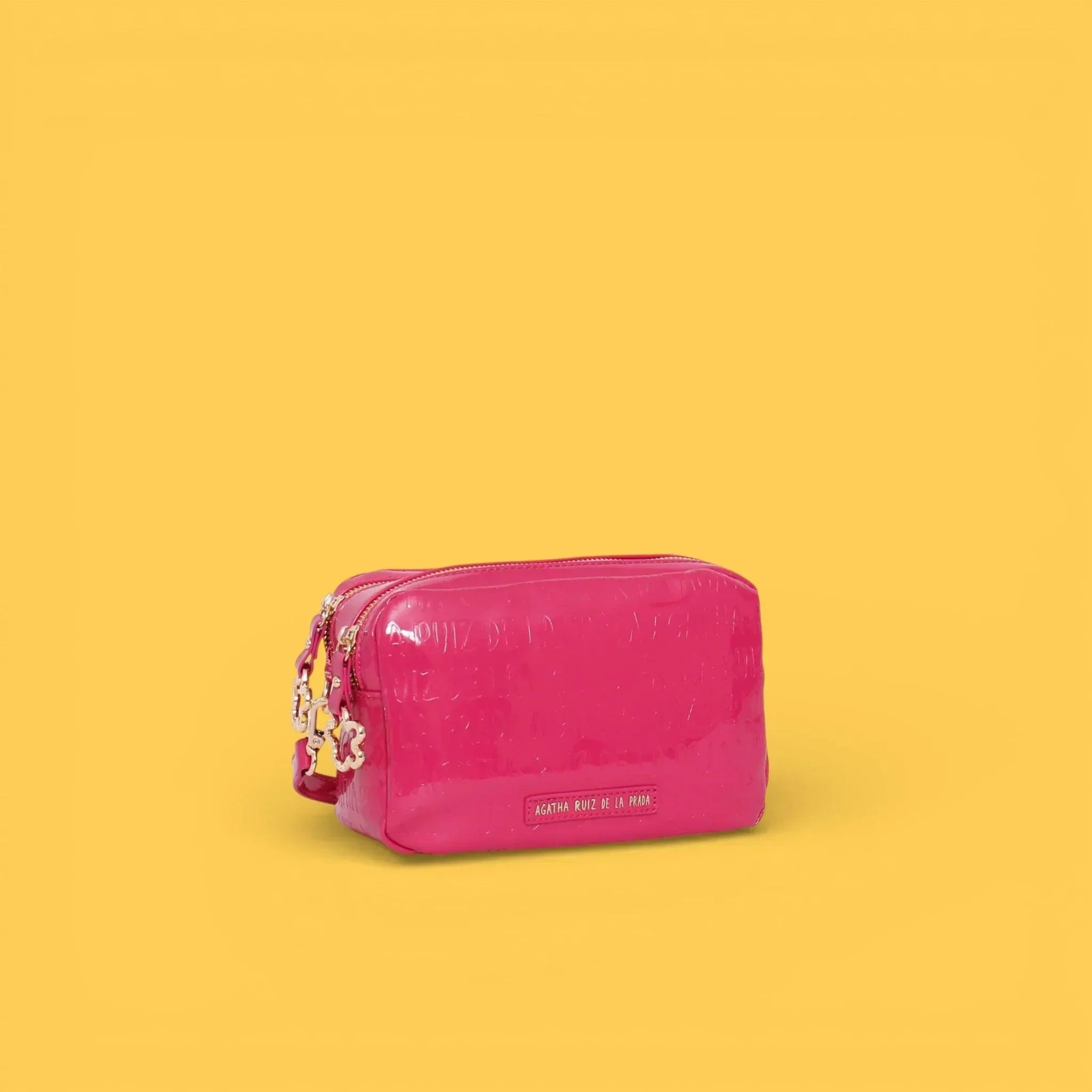 BANDOLERA CHAROL LOGO FUCSIA