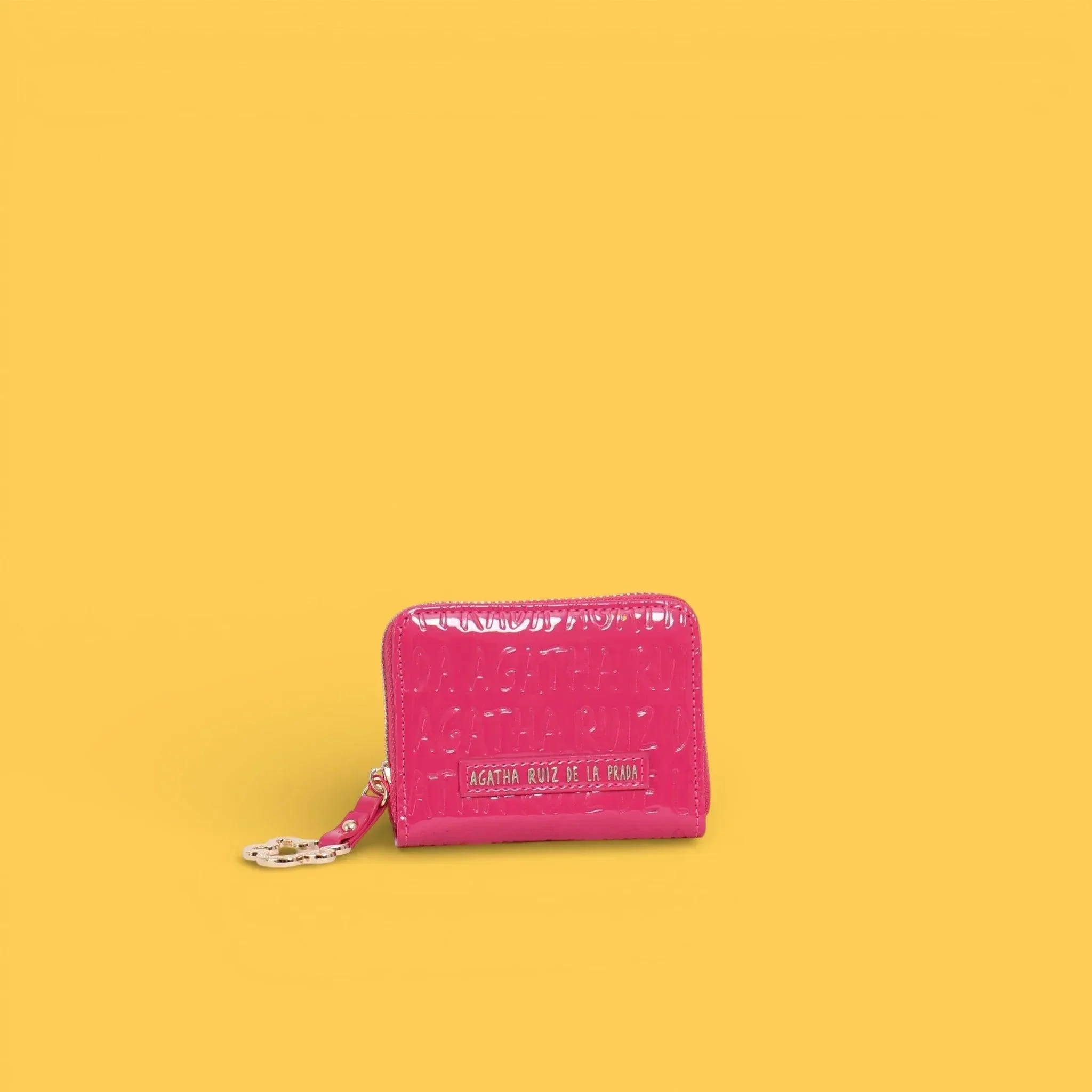 MONEDEROS CHAROL LOGO FUCSIA